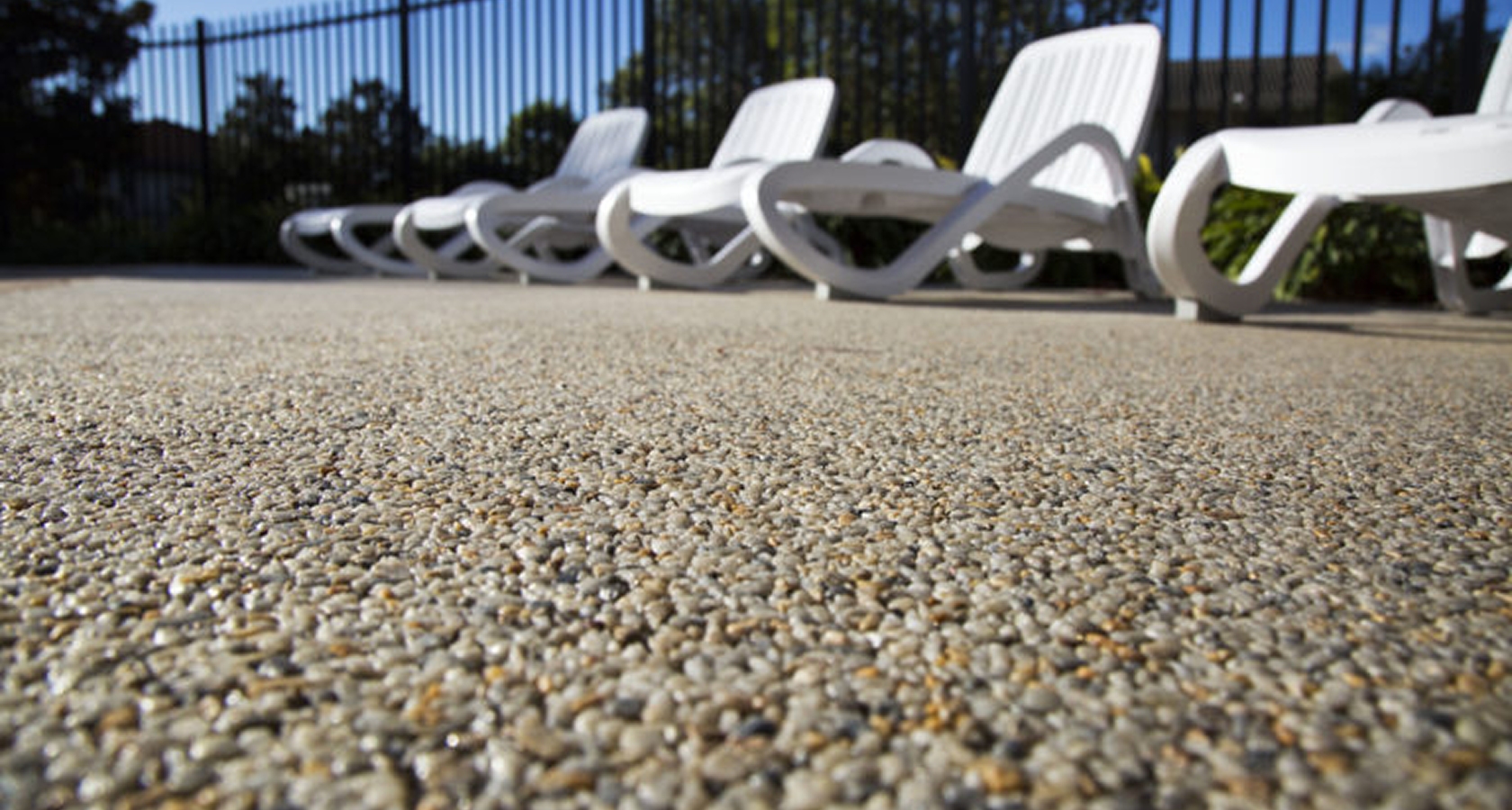 Keep Your Pool Deck and Lawn Looking Great with Gravel and Pour On c