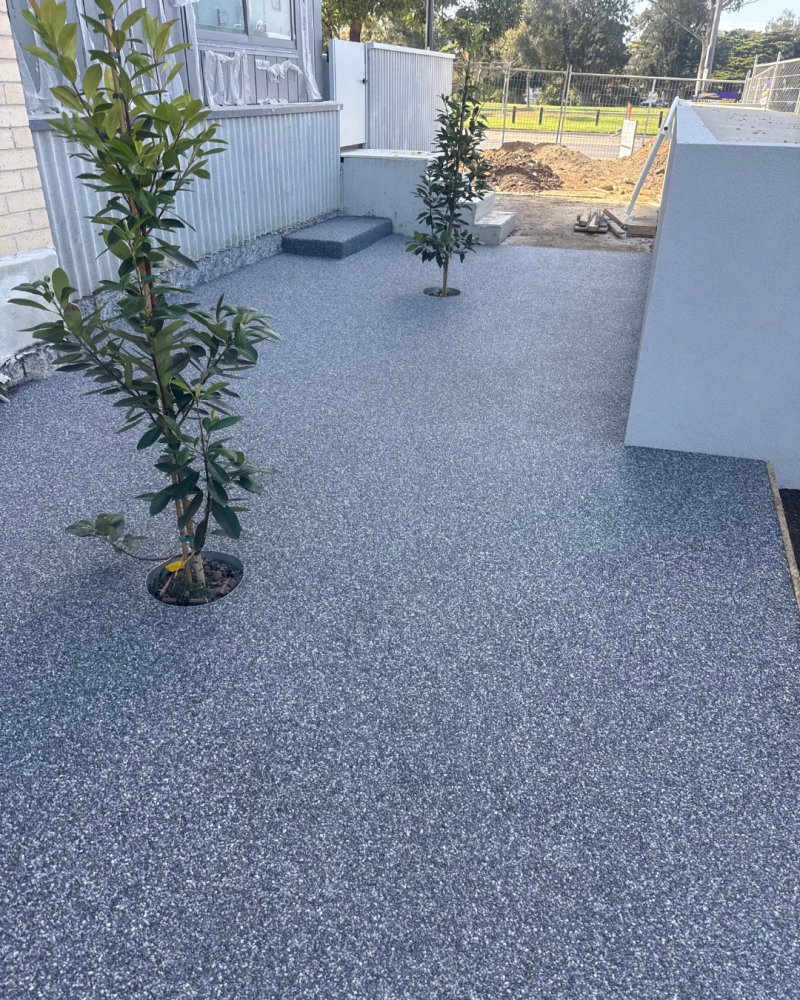 StoneSet 6mm Koonunga permeable paving around a newly planted courtyard tree