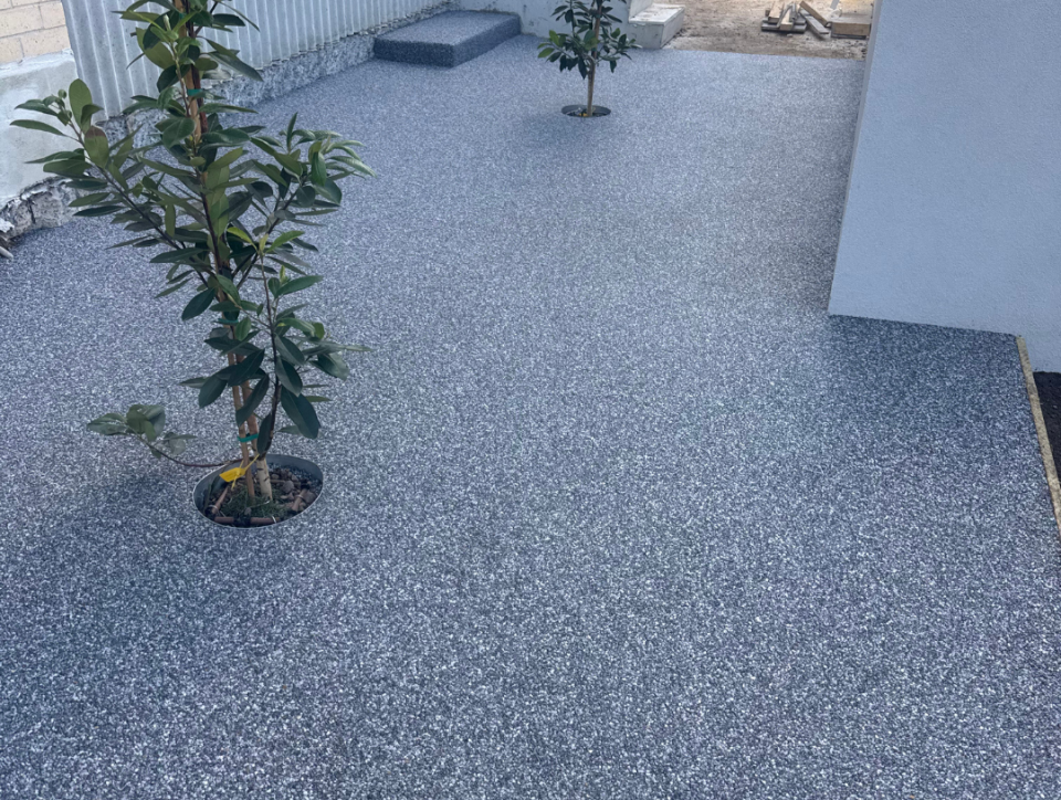 StoneSet 6mm Koonunga permeable paving around a newly planted courtyard tree